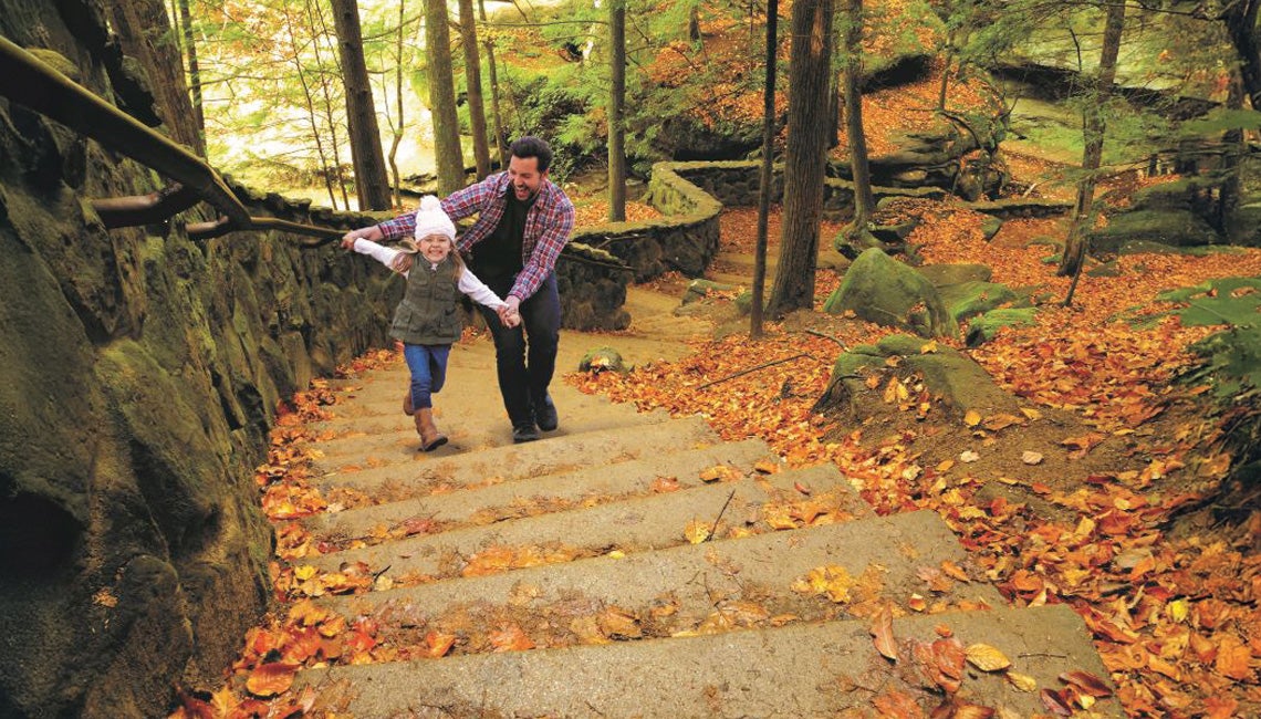 Running what is perhaps the most iconic property  in the Hocking Hills has always been a family affair. A father and daughter playing in the woods