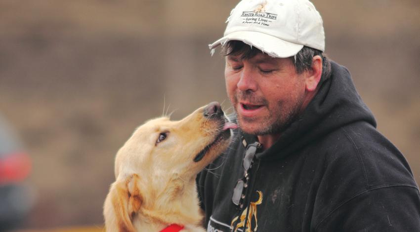 Greg Mahle with a dog