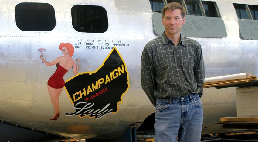 Dave Shiffer poses with Champaign Lady in the museum’s hangar.