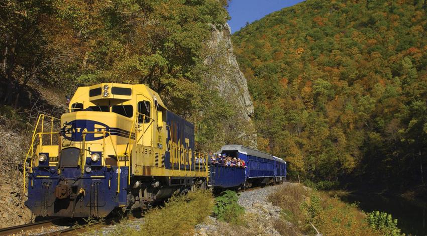 A photo of the Potomac Eagle carrying passengers through the mountains.