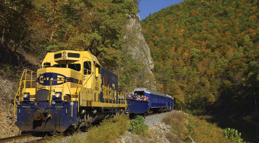 A photo of the Potomac Eagle carrying passengers through the mountains.