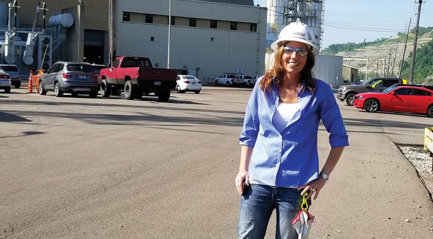 Bethany Schunn, plant manager for Cardinal Power Plant, smiles for a photo.