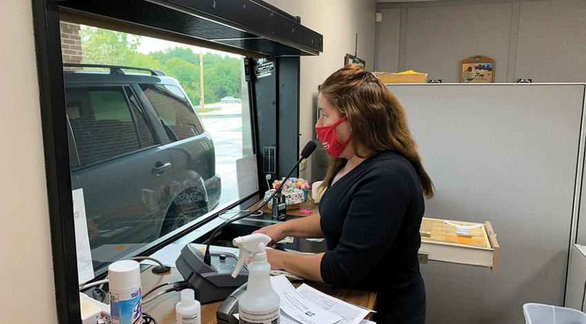 Co-op employee at drive-thru