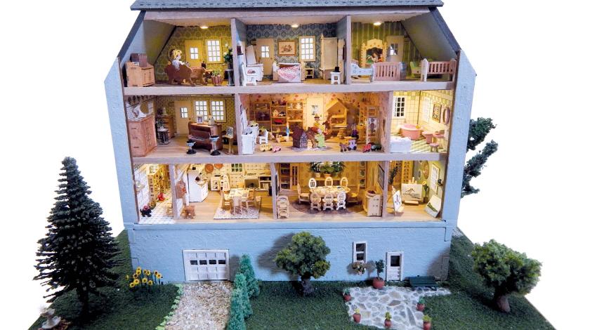 A five-story, 1/144-scale dollhouse. 