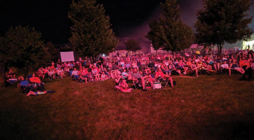 A crowd watching the fireworks show