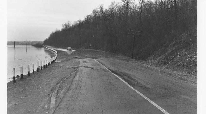 After the rains, a flooded road that led around the lake toward Reily (courtesy Reily Historical Society).
