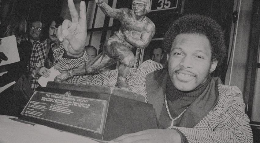 Archie Griffin with his Heisman Trophy