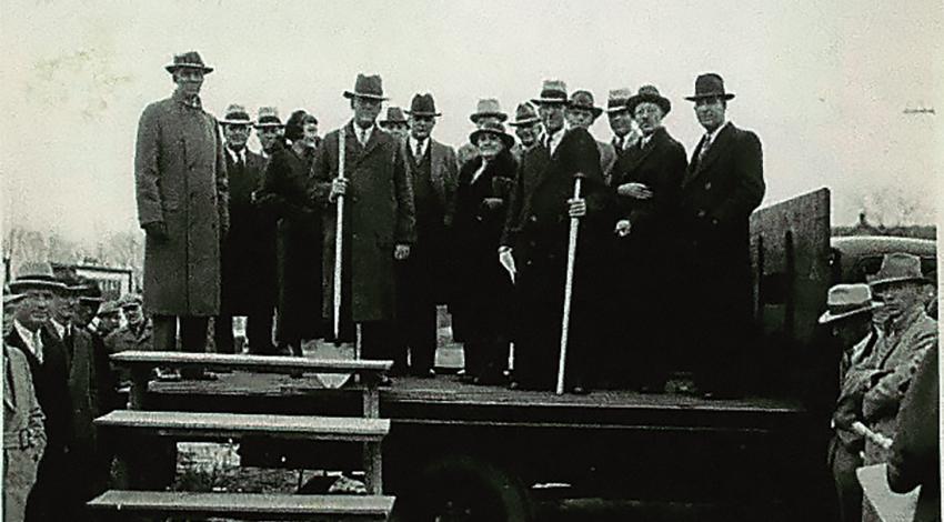 The historic groundbreaking ceremony of the setting of the nation's first electric cooperative utility pole