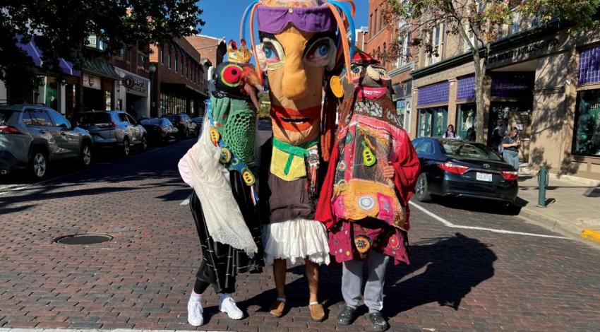 Giant puppets at the Honey for the Heart Parade