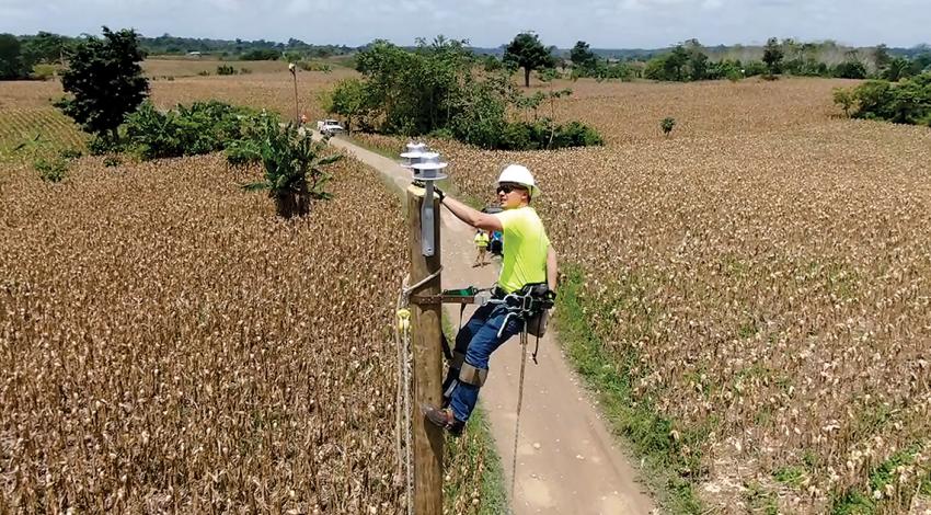 Lineworker on pole