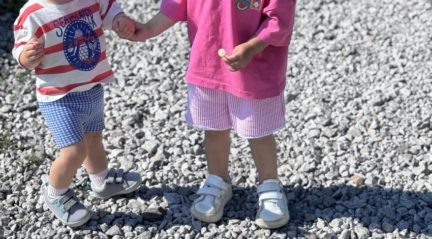 two little girls holding hands