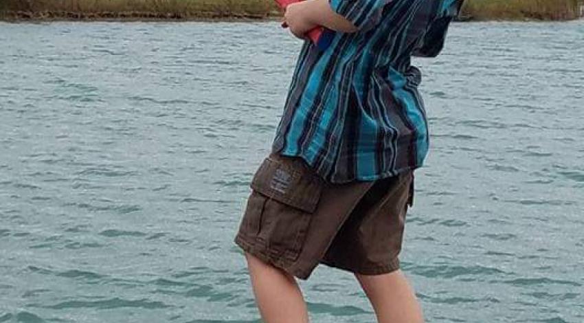 young boy fishing