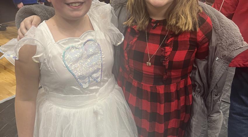 Two kids dressed up for a play