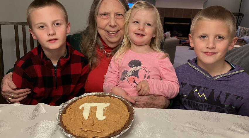 woman and three children with Pi pie