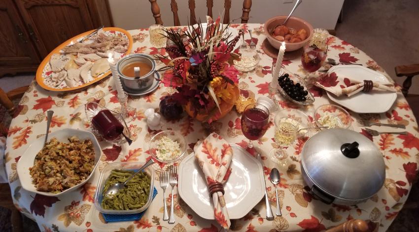 Thanksgiving table with food and decorations