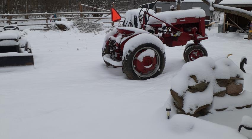 red tractor in the snow