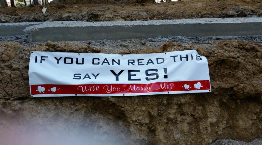 sign that says "if you can read this, say yes!"
