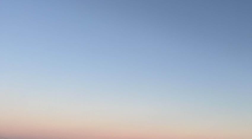 sunset over snowy fields