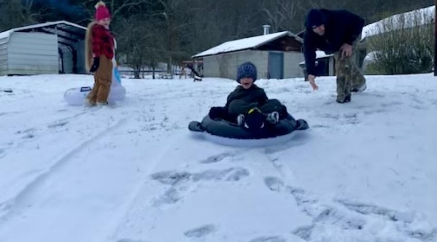 people sledding