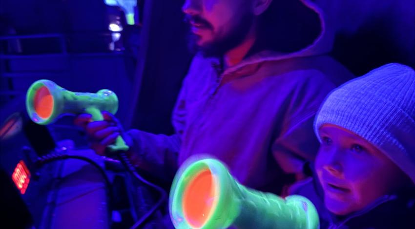 man and boy on ride