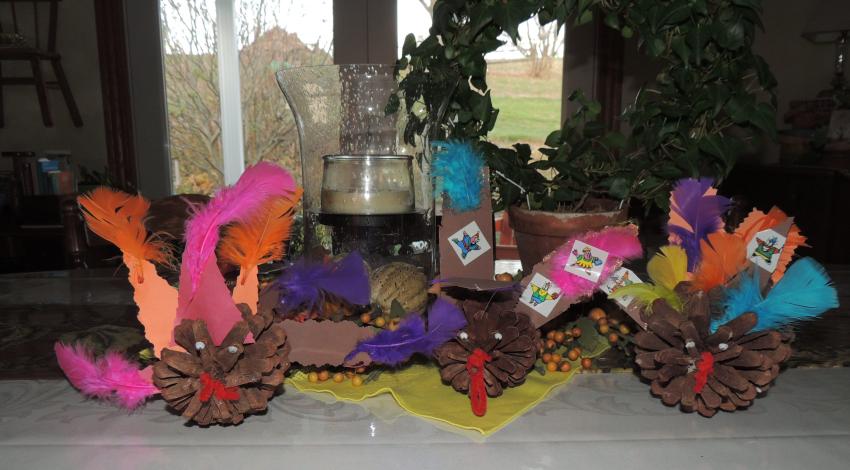 pinecone turkey decorations on table