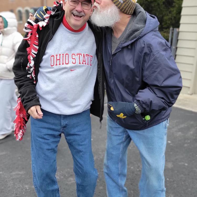 men in Ohio State and Michigan gear