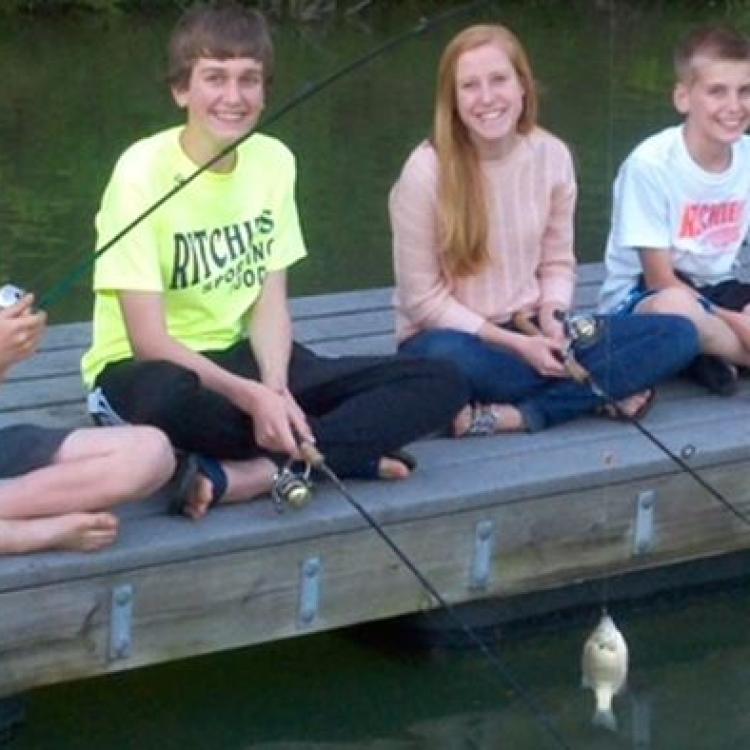 four kids fishing