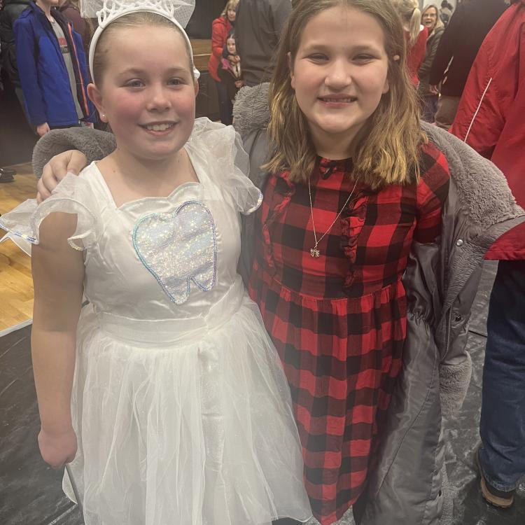 Two kids dressed up for a play