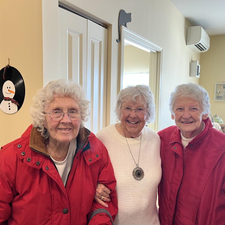 three smiling women