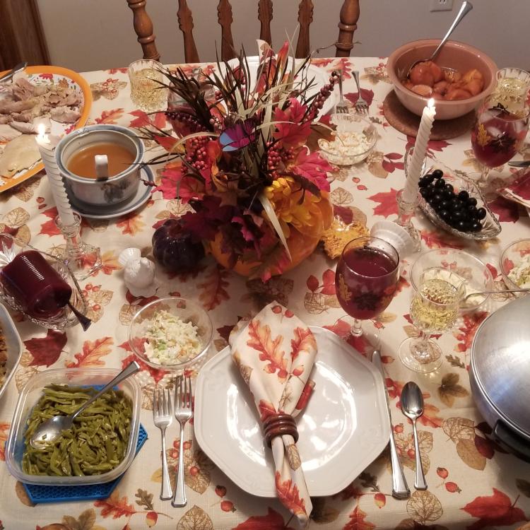 Thanksgiving table with food and decorations