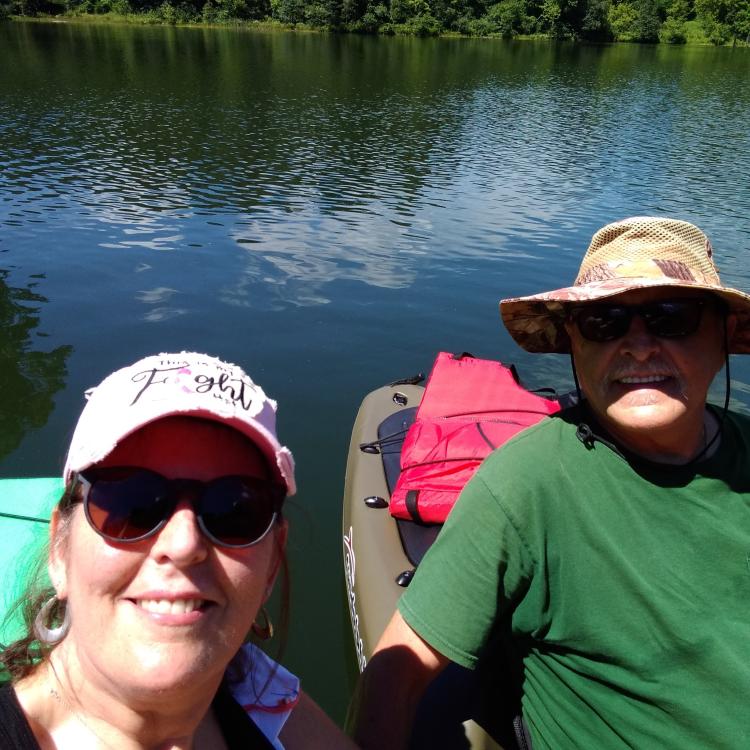 man and woman in kayak
