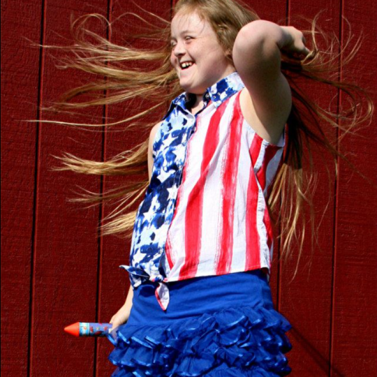 girl with long hair blowing all around her