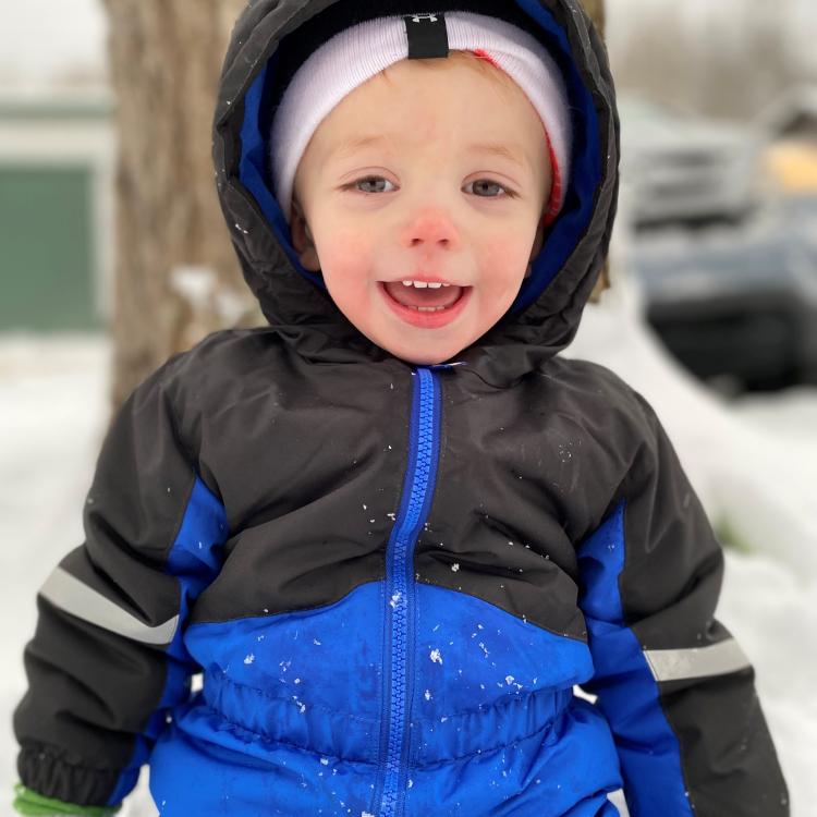 smiling child in snow