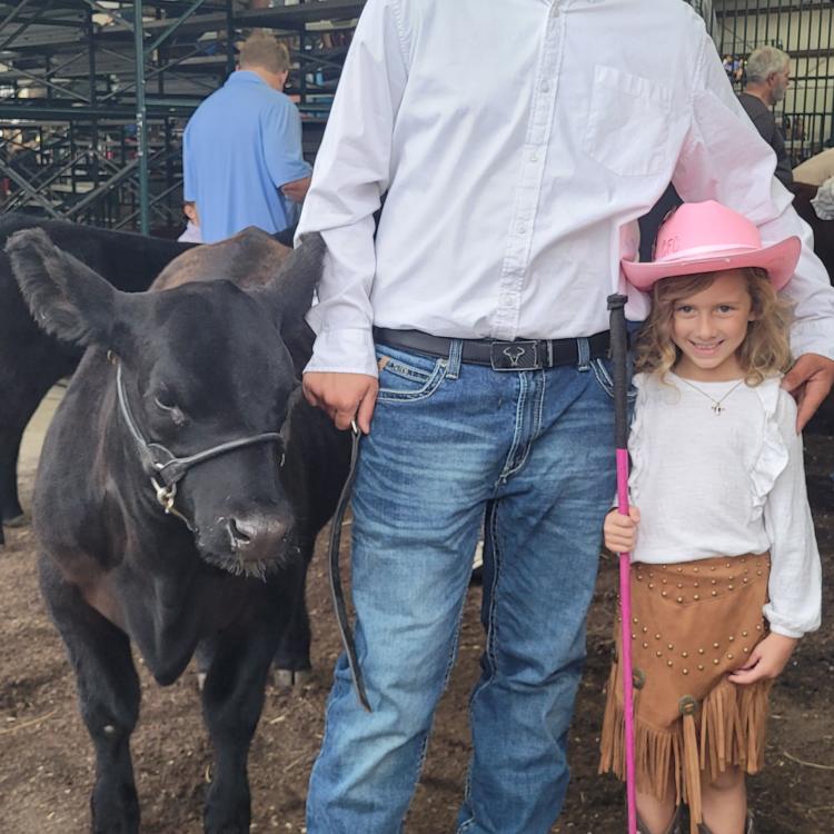 boy, girl, and cow