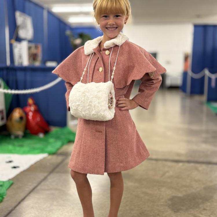 little girl in coat