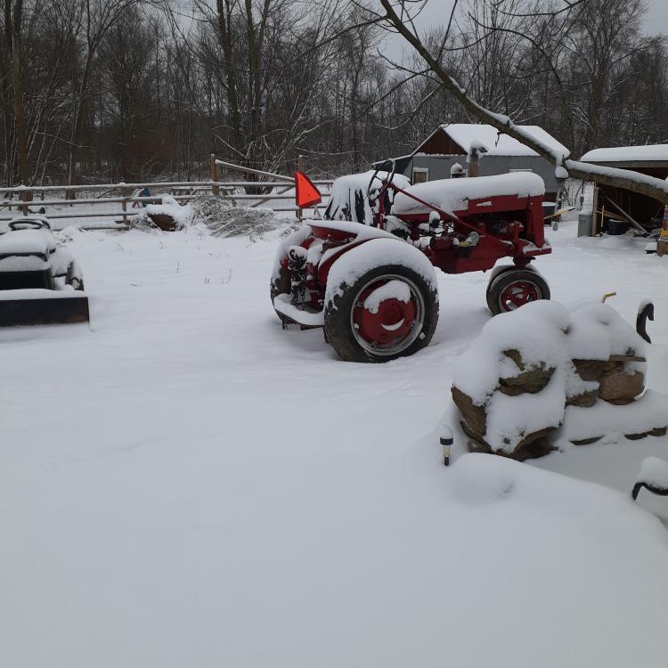red tractor in the snow