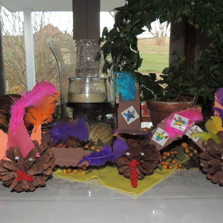 pinecone turkey decorations on table