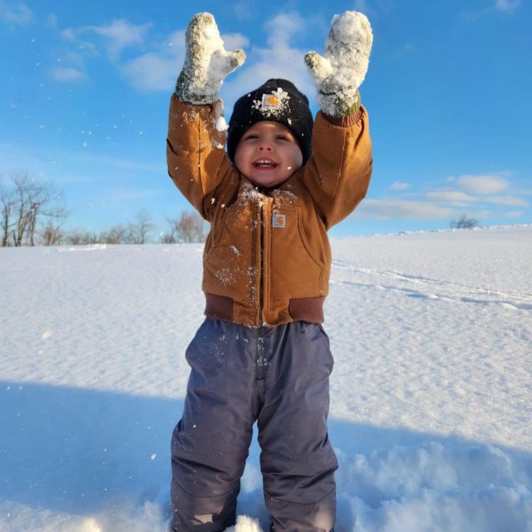 boy playing in snow