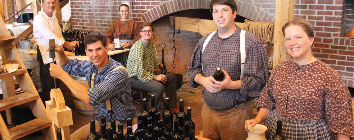 The staff at Carillon Brewing Company smile for a picture.