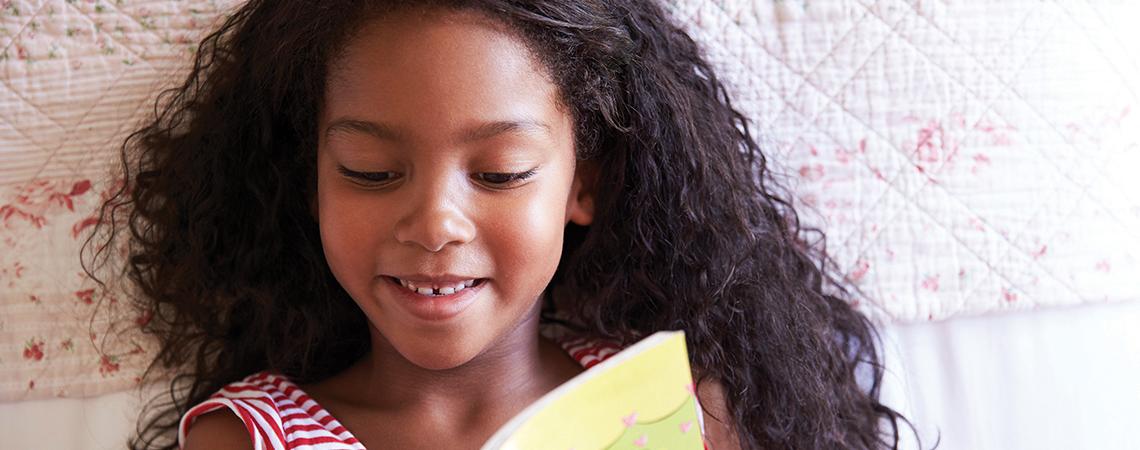 Girl reading a book (Credit: Getty Images)