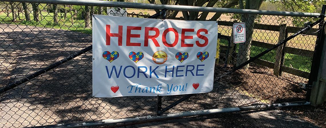 Heroes Work Here sign