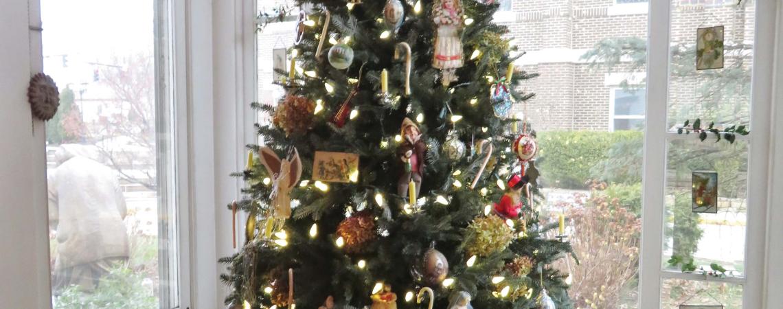 The Christmas tree in the window of the rectory at St. Mary of the Immaculate Conception Church