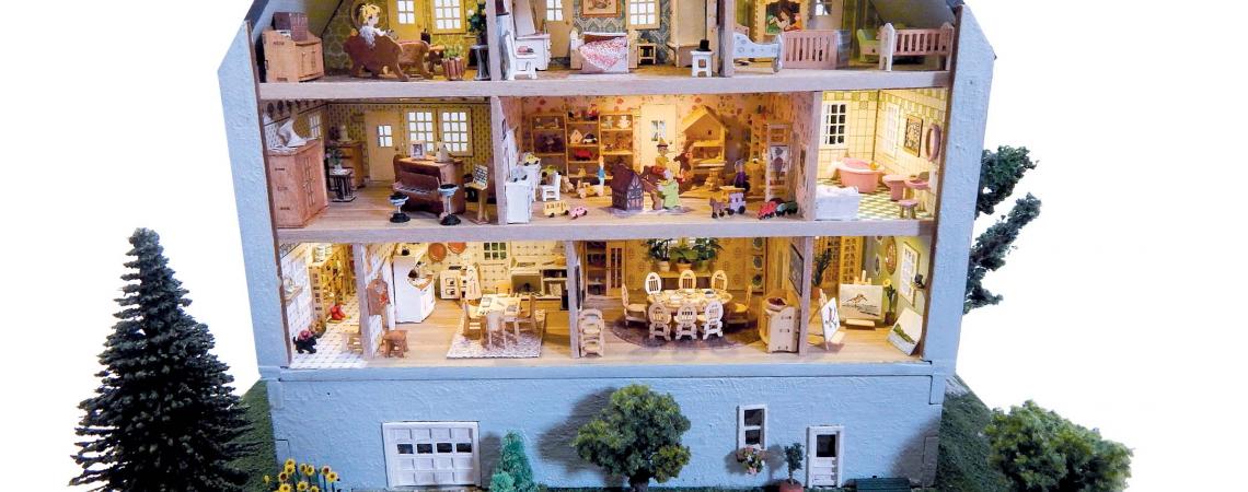 A five-story, 1/144-scale dollhouse. 