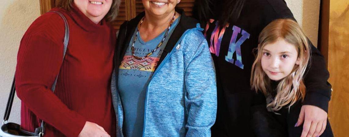 Tracy Elder (left) poses with chaplains Debra Homegun (center) and Jenn Buckley and Buckley’s daughter, Hayley, of the Native Nations Chaplaincy Alliance during a recent visit.