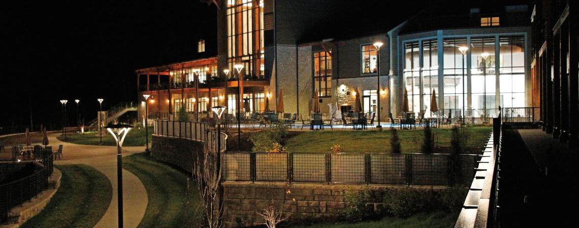 The Hocking Hills State Park Lodge entranceway lights up the night.