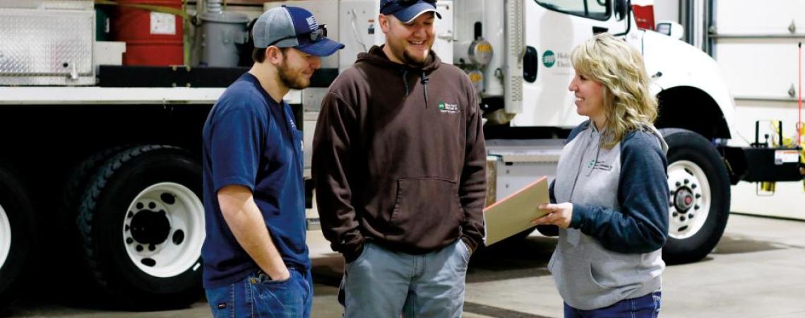 Robyn Tate (right) handles both human resources and community relations at Holmes-Wayne Electric Cooperative in Millersburg, so she has a unique vantage point to see the co-op’s importance to the area.