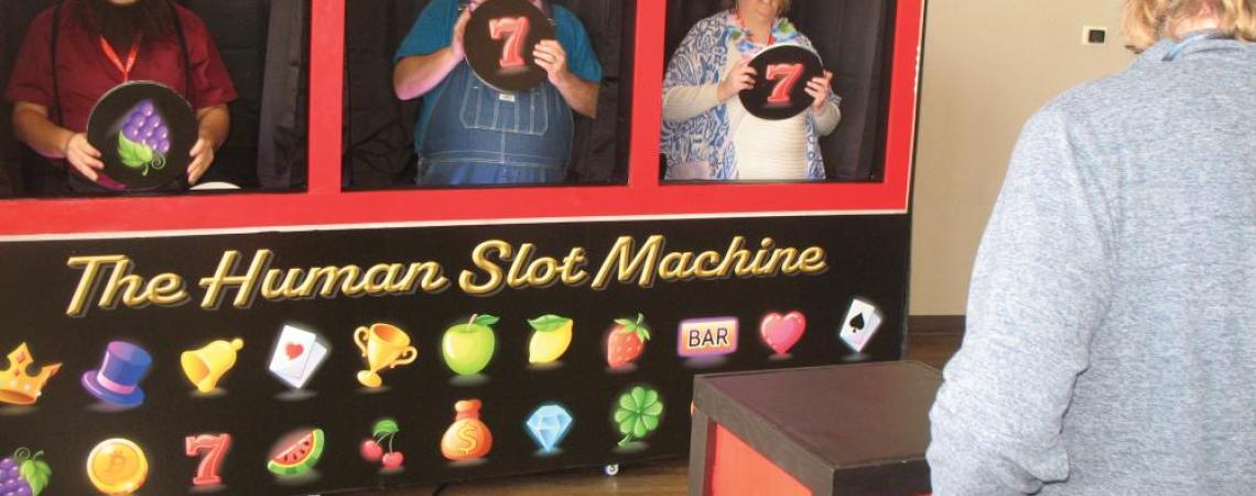 A group of people playing a gameshow-style game during a land cruise