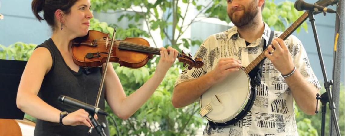 Korey and Abby Wimbiscus Black playing instruments