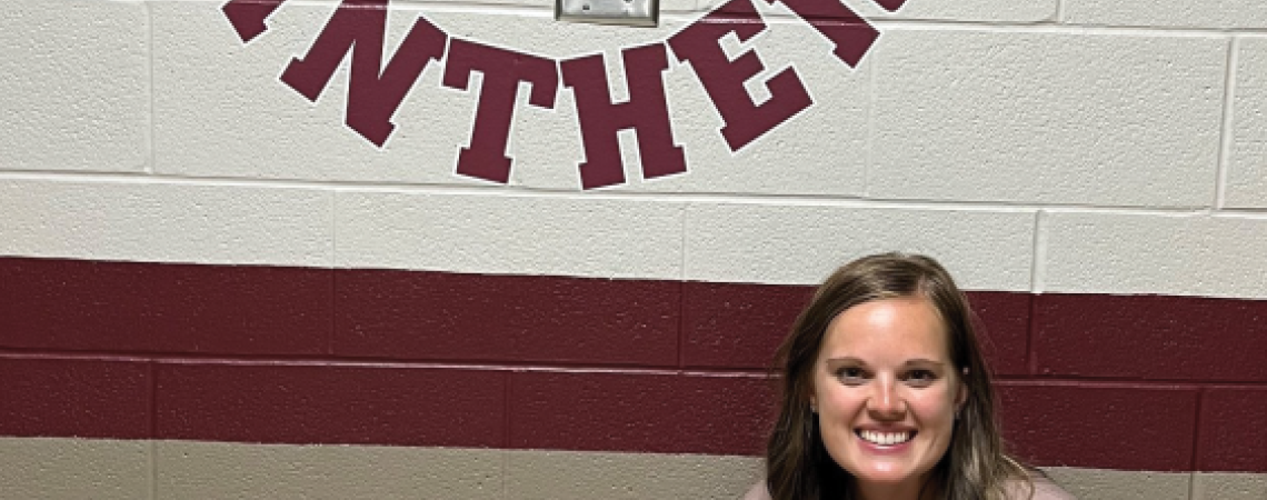 Maddie Reinhart with her therapy dog Luna