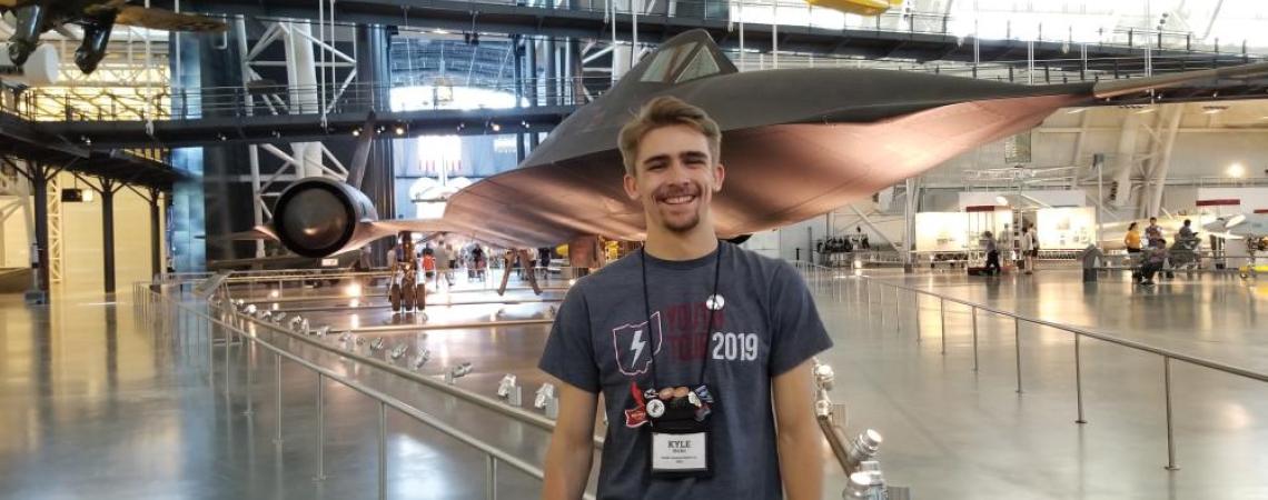 Kyle Hicks, an Ohio Youth Tour delegate, posing at the National Air & Space Museum